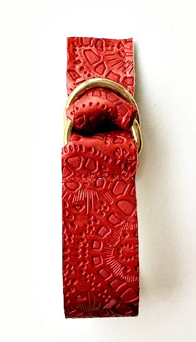 Embossed adjustable shawl belts